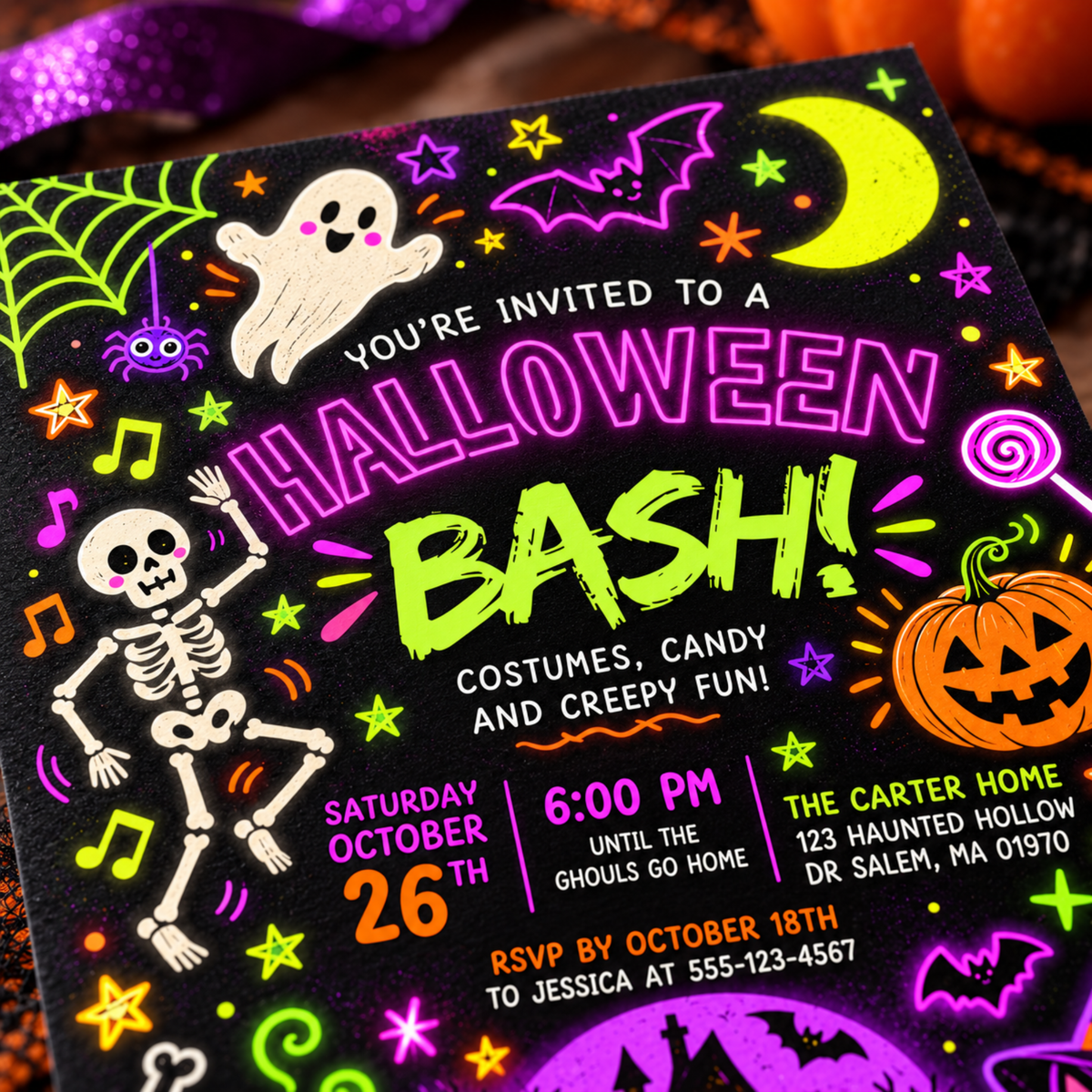 Close-up of neon Halloween Bash lettering, a ghost and dancing skeleton