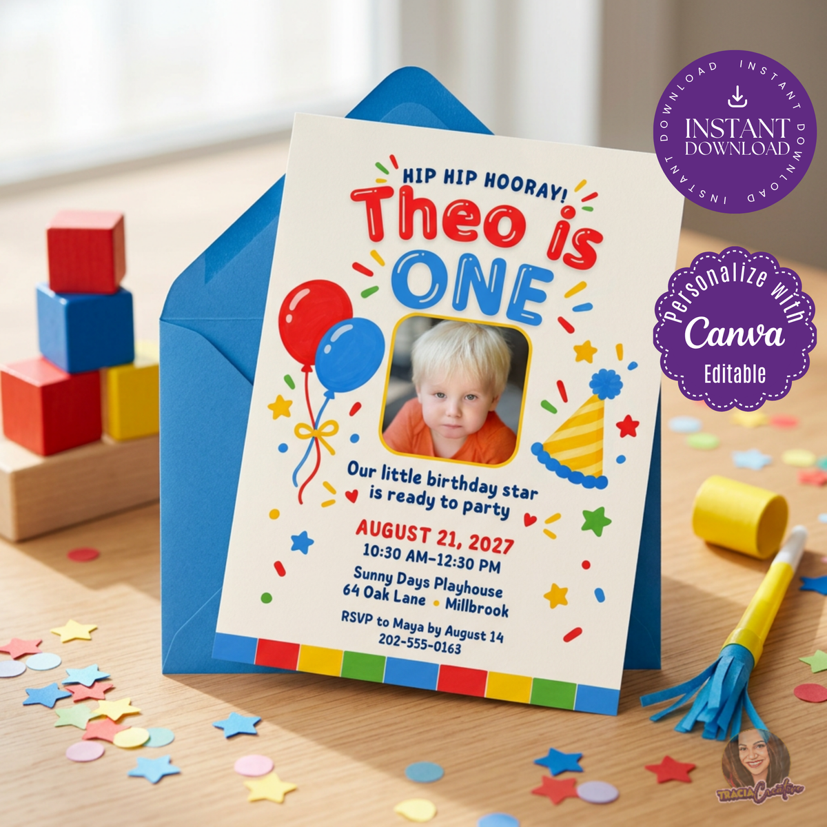 Colorful first birthday photo invitation with balloons and a child's portrait, styled with a blue envelope and blocks.