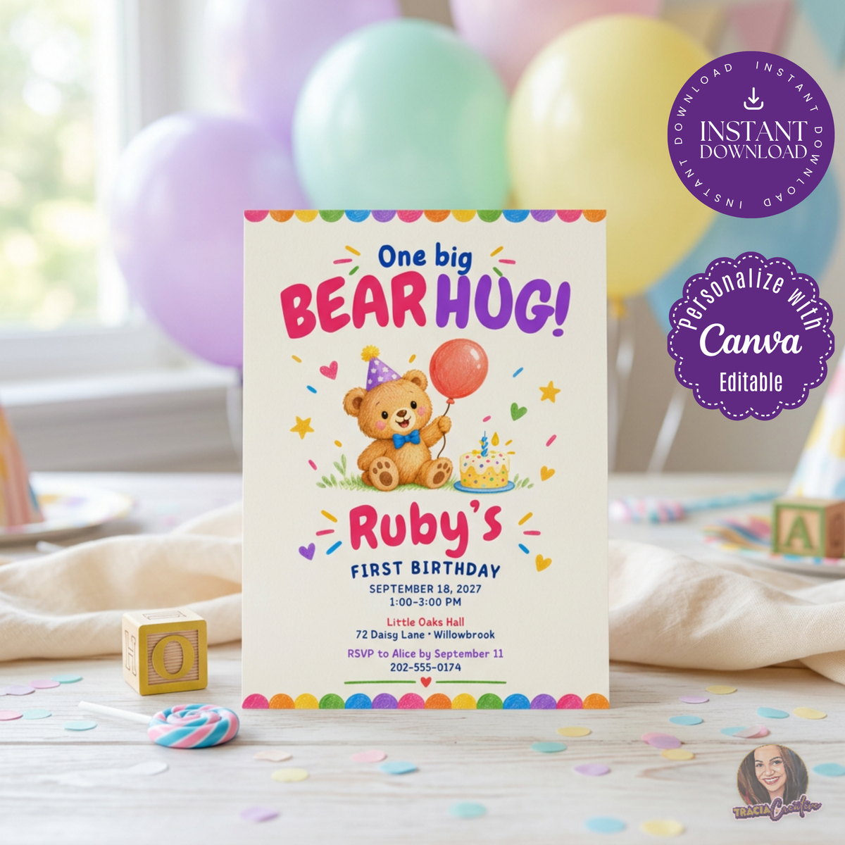 One Big Bear Hug first birthday invitation with a colorful teddy bear, balloon and confetti, standing among pastel birthday balloons.